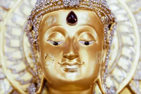 Buddha statue detail supporting meditation teaching