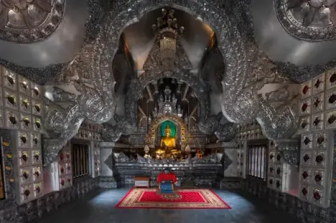 Interior view of a silver-toned temple in Chiang Mai