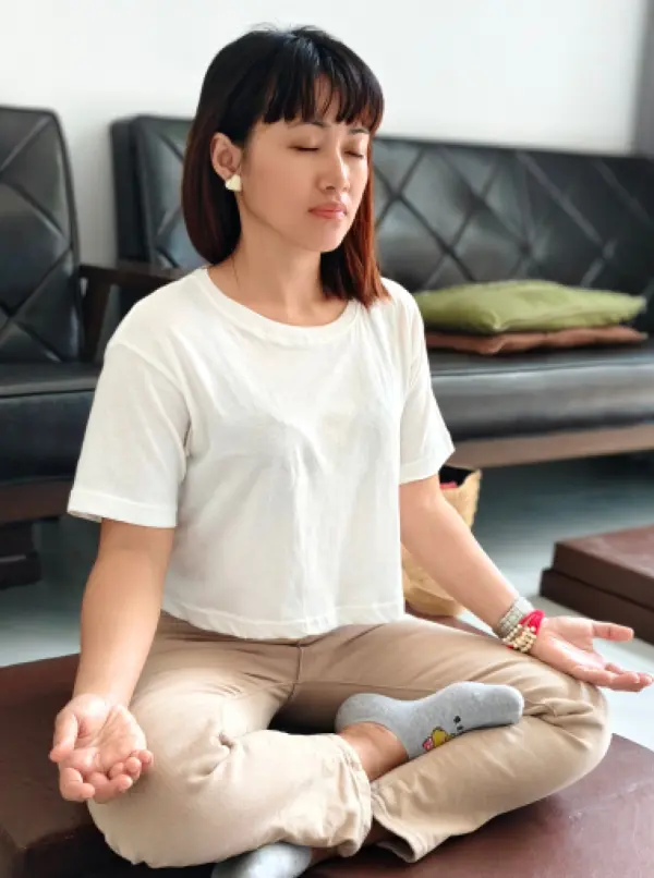 Student in peaceful seated meditation practice