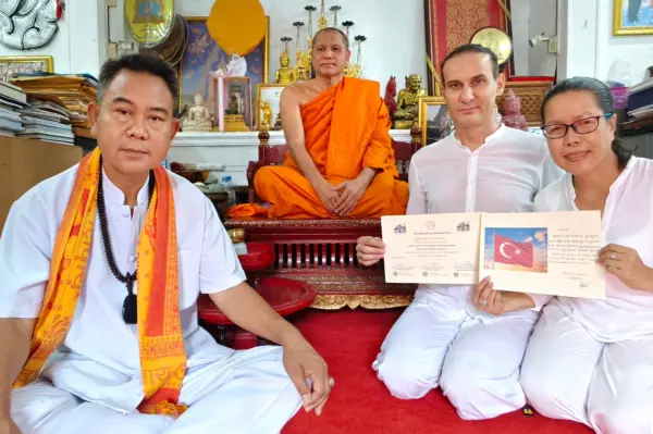 Certificate ceremony with monk and international students